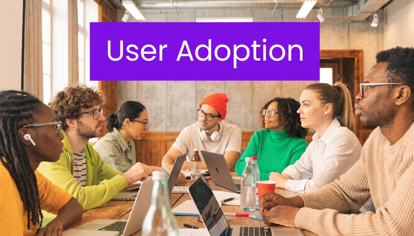 A diverse team of professionals collaborating around a table during a meeting about user adoption strategies.